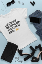 Load image into Gallery viewer, I am the Rich Doctor My Mom Wanted Me to Marry Bella+Canvas Unisex Tee - PHD Women in STEM - Doctor Gift - Grad Gift
